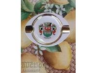 Porcelain ashtray with gilding.