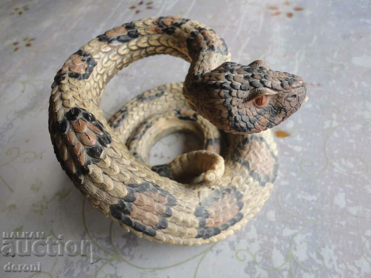 A sculpture of a rattlesnake figure with price 140.00 BGN | € 71.58 A sculpture of a rattlesnake figure with price 140.00 BGN | € 71.58