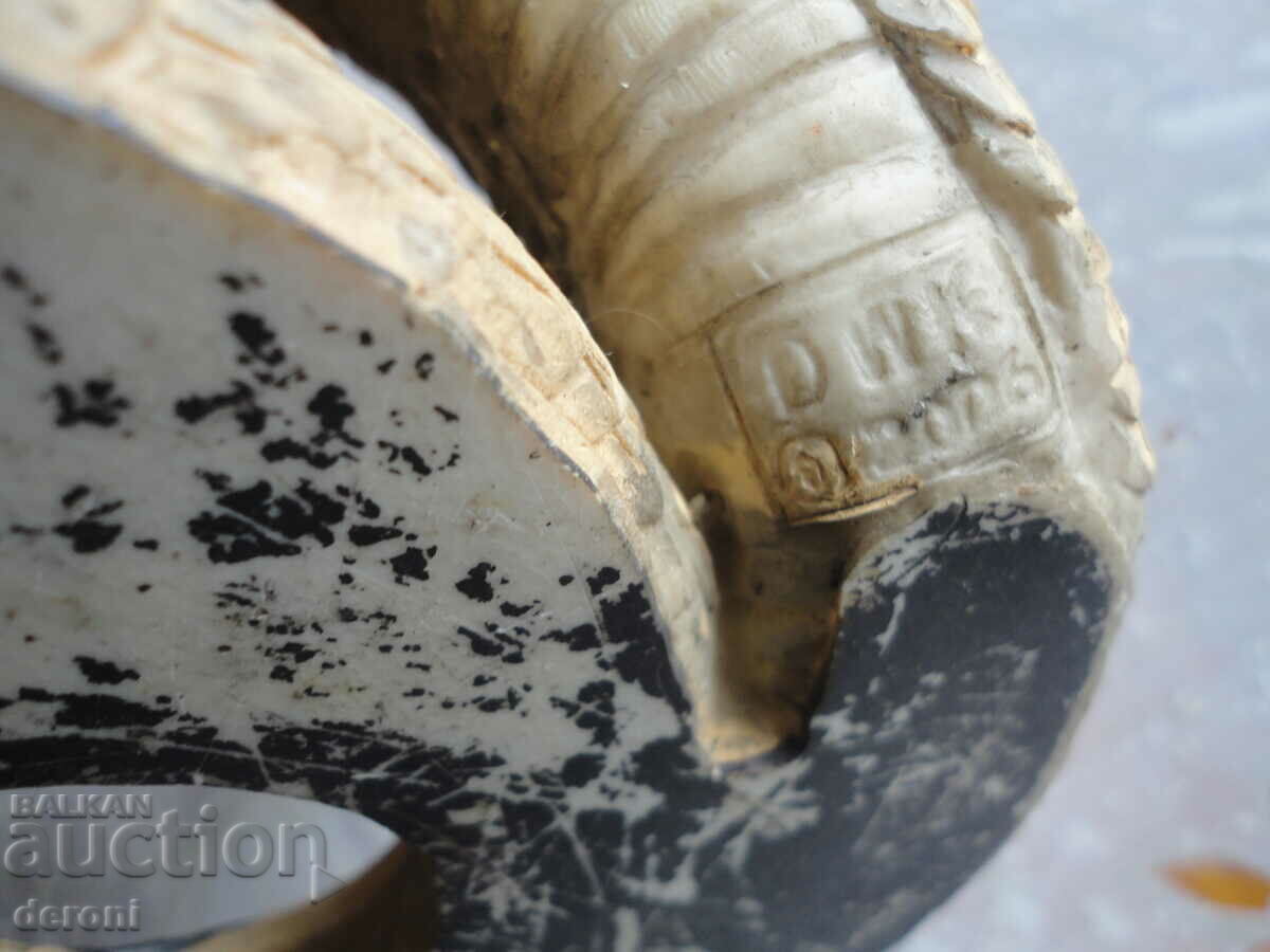 A sculpture of a rattlesnake figure - 6 A sculpture of a rattlesnake figure - 6