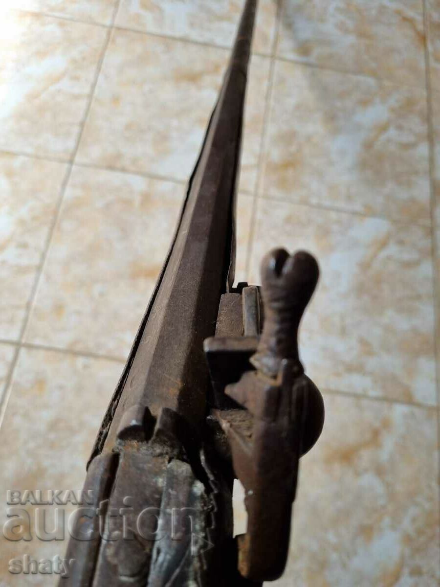 Old rifle secured. - 6