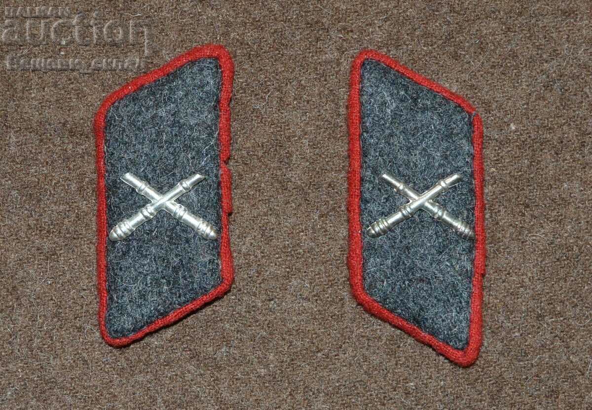 κουμπότρυπες για το πανωφόρι ενός πυροβολητή BNA