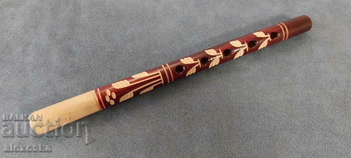 Old wooden whistle
