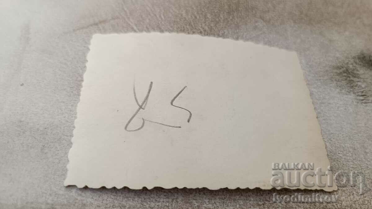 Photo of a man and two women on the beach with price 1.15 BGN | € 0.59 Photo of a man and two women on the beach with price 1.15 BGN | € 0.59