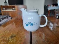 An old porcelain jug, a jug