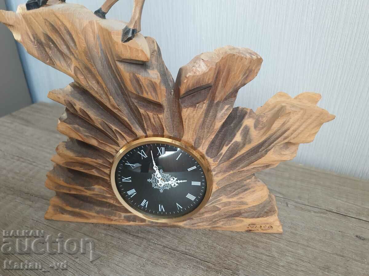 Auction  Mechanical table clock with wood carving