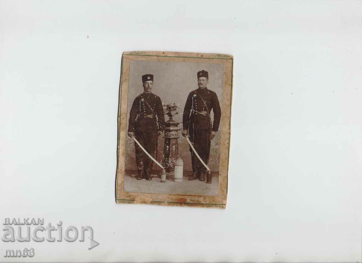 Cardboard photo of royal officers