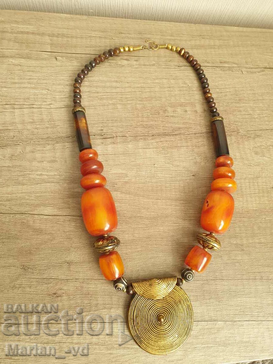 Old massive artificial amber necklace