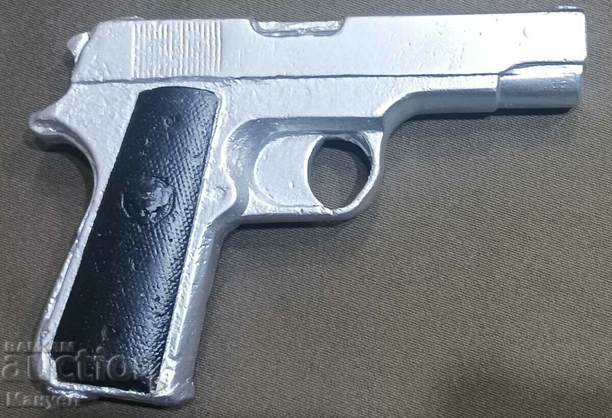 Old military model of a pistol.