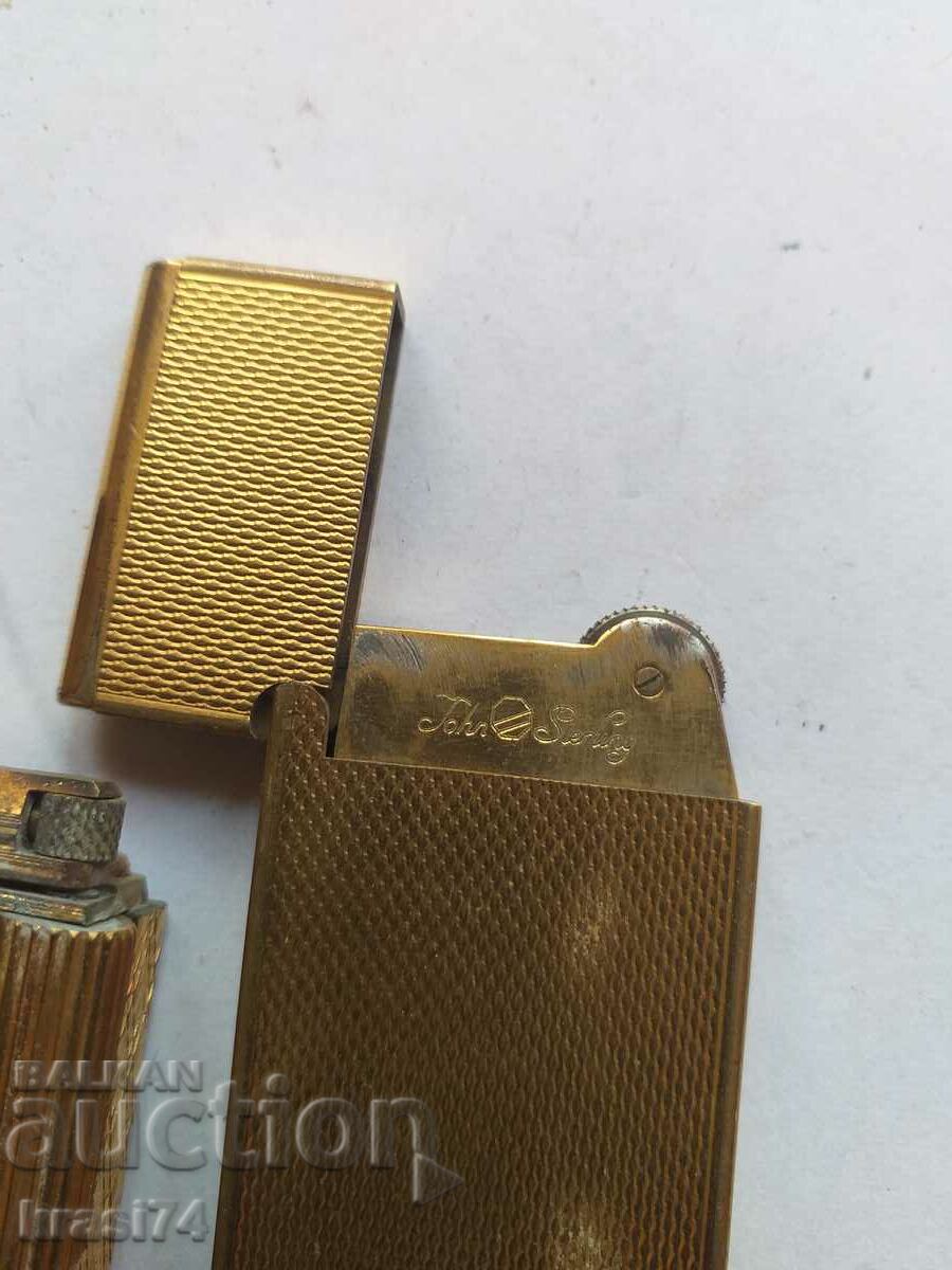 Auction 2 pcs. gold-plated lighters Auction 2 pcs. gold-plated lighters