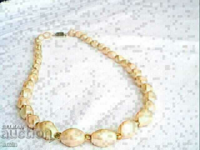 old beautiful jade necklace made of natural stone old beautiful jade necklace made of natural stone