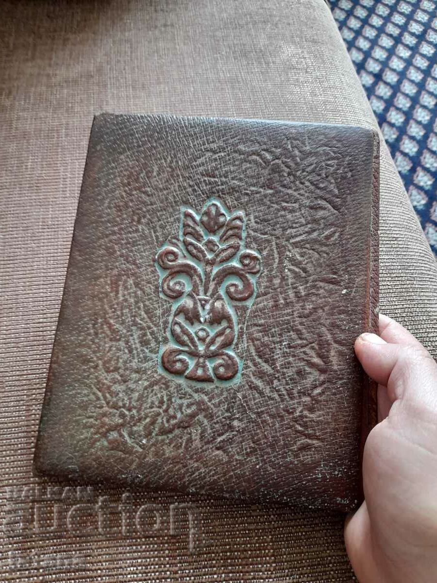 Delivery of An old leather folder Delivery of An old leather folder