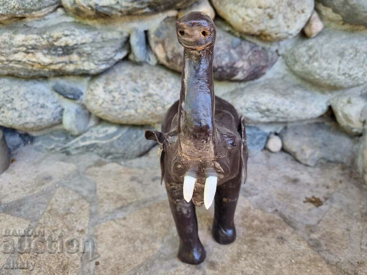 A large leather elephant with price 55.00 BGN | € 28.12 A large leather elephant with price 55.00 BGN | € 28.12