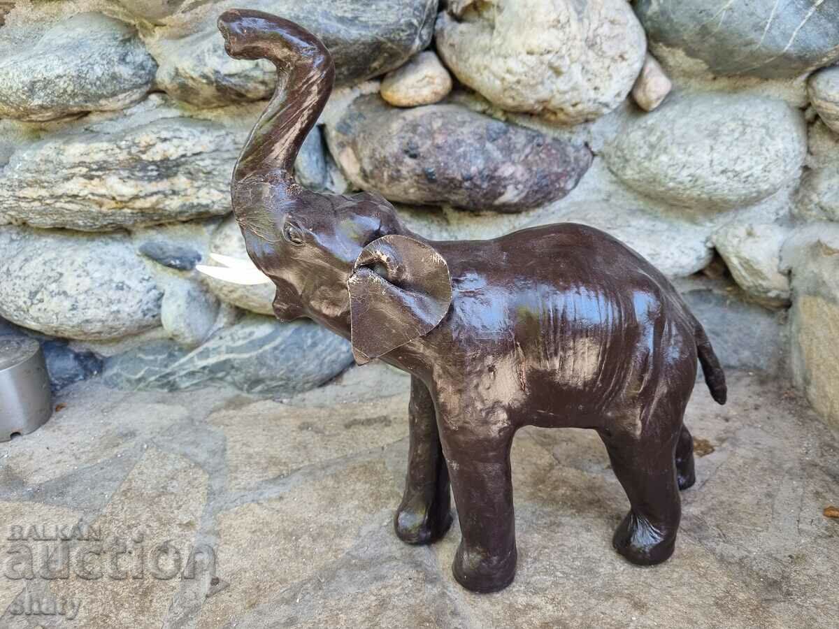 Auction A large leather elephant Auction A large leather elephant