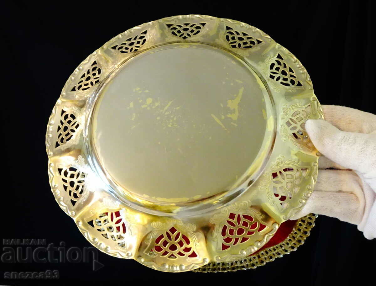 Auction Bronze plate with openwork 23 cm, baroque relief Auction Bronze plate with openwork 23 cm, baroque relief