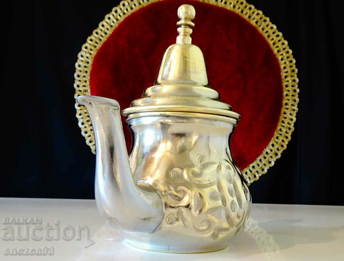 Arab bronze teapot for mulled wine, rakia, relief with price 39.00 BGN | € 19.94 Arab bronze teapot for mulled wine, rakia, relief with price 39.00 BGN | € 19.94