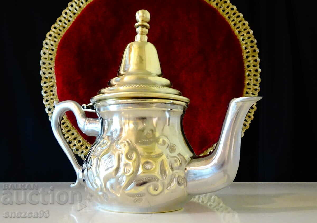 Auction Arab bronze teapot for mulled wine, rakia, relief Auction Arab bronze teapot for mulled wine, rakia, relief