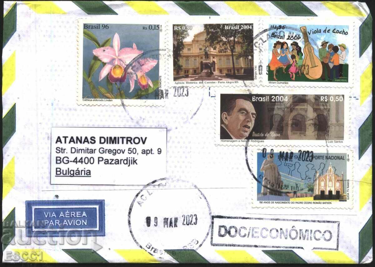 Traveled envelope with stamps Flowers 1996 Architecture 2004 from Brazil