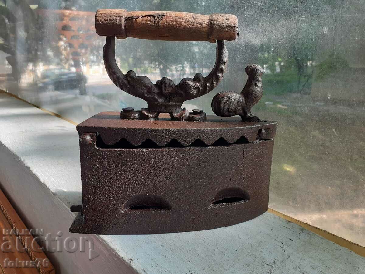 An old cast iron iron on fire with price 69.00 BGN | € 35.28 An old cast iron iron on fire with price 69.00 BGN | € 35.28