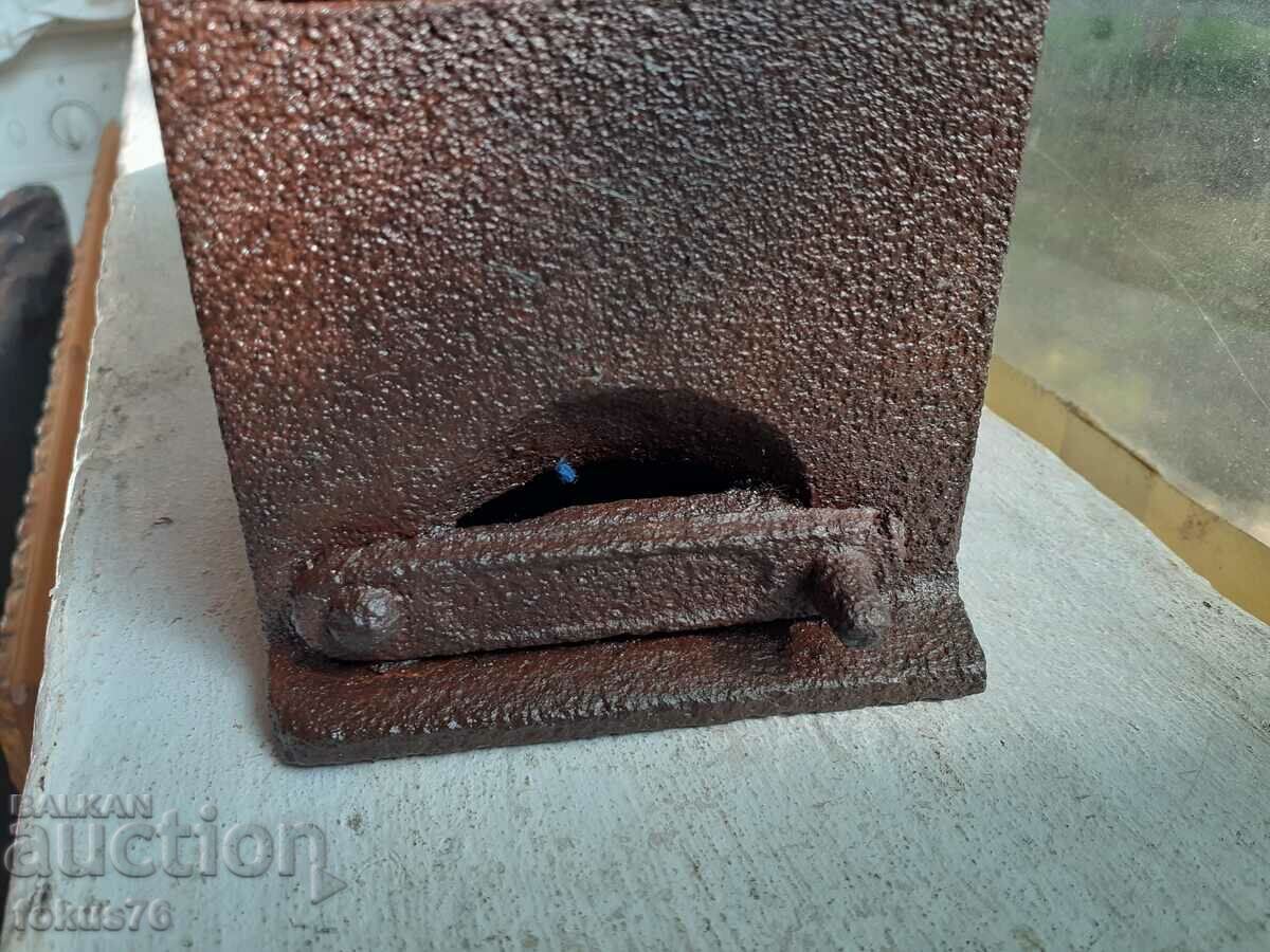 Delivery of An old cast iron iron on fire Delivery of An old cast iron iron on fire