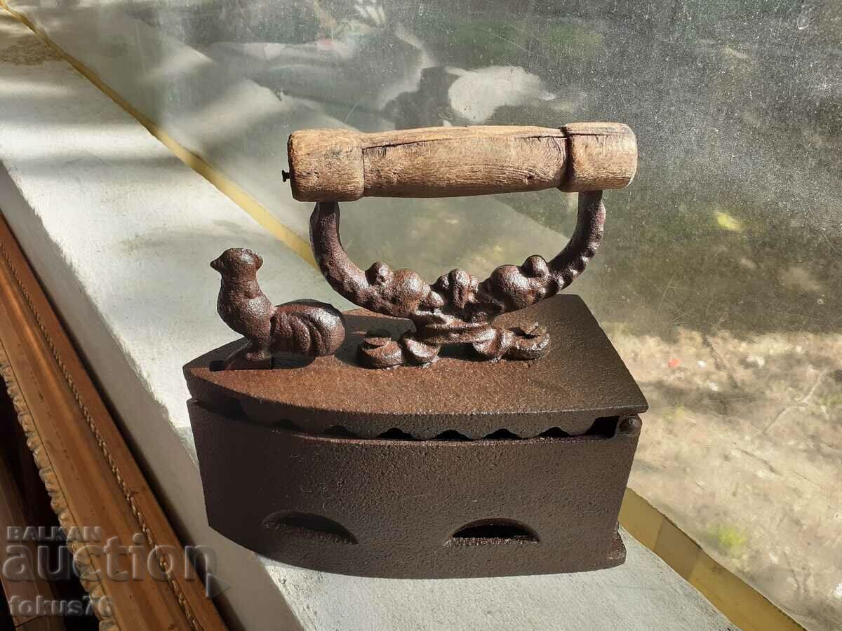 An old cast iron iron on fire - 5 An old cast iron iron on fire - 5