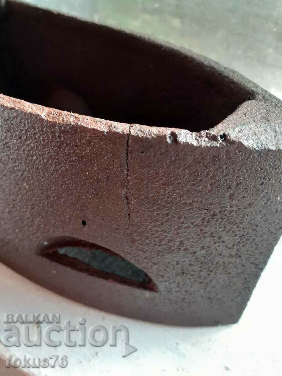 An old cast iron iron on fire - 7 An old cast iron iron on fire - 7
