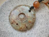 Necklace/Necklace/Jewelry with central rotating element