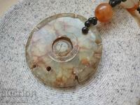 Necklace/Necklace/Jewelry with central rotating element