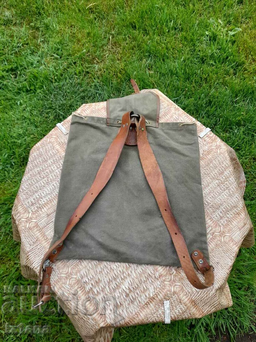 Delivery of Old tarpaulin backpack