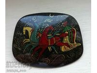 Russian Palekh brooch on stone lacquer finish