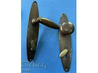 Old brass doorknobs shields