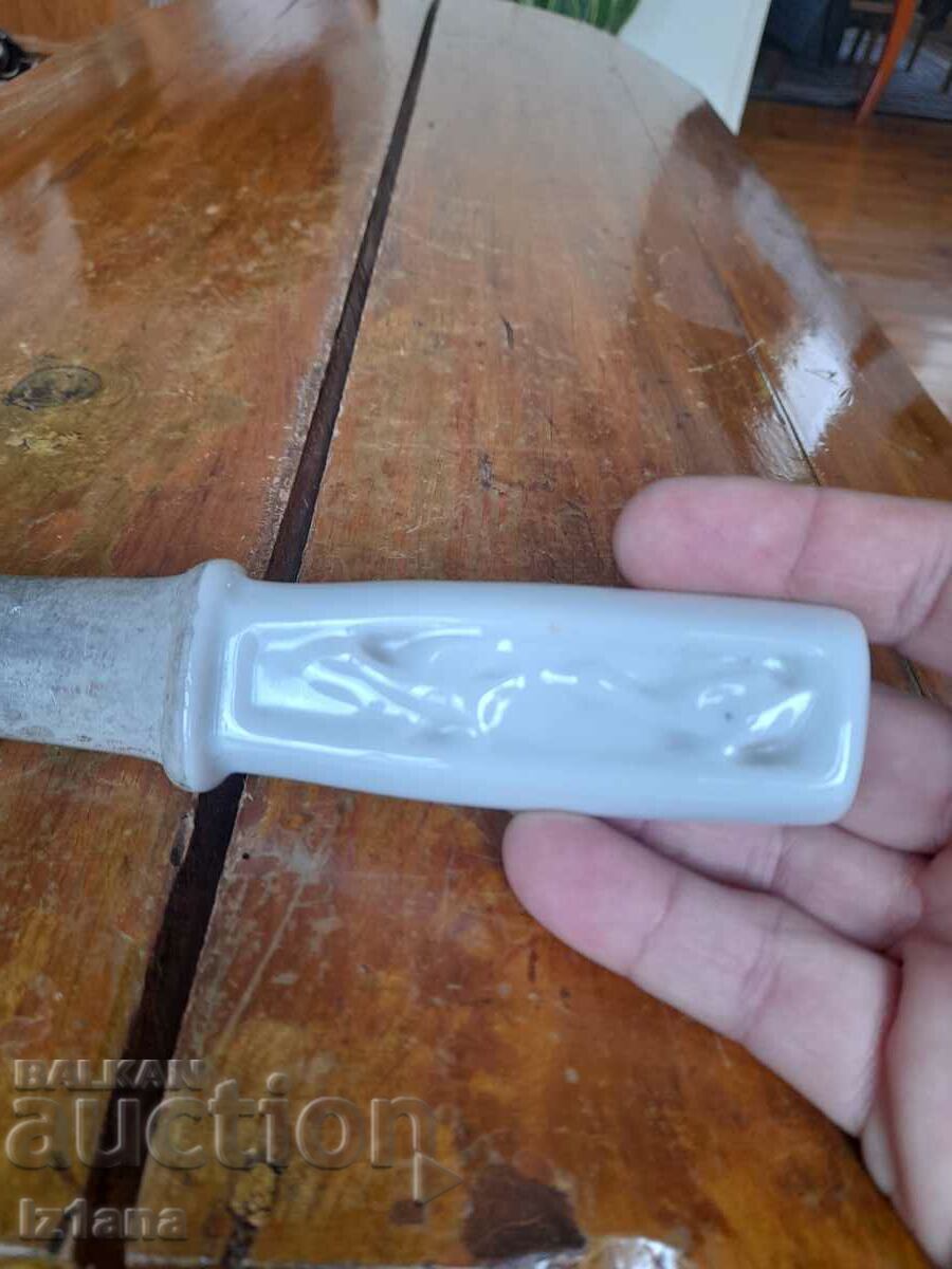 Delivery of Old porcelain knife sharpener Delivery of Old porcelain knife sharpener