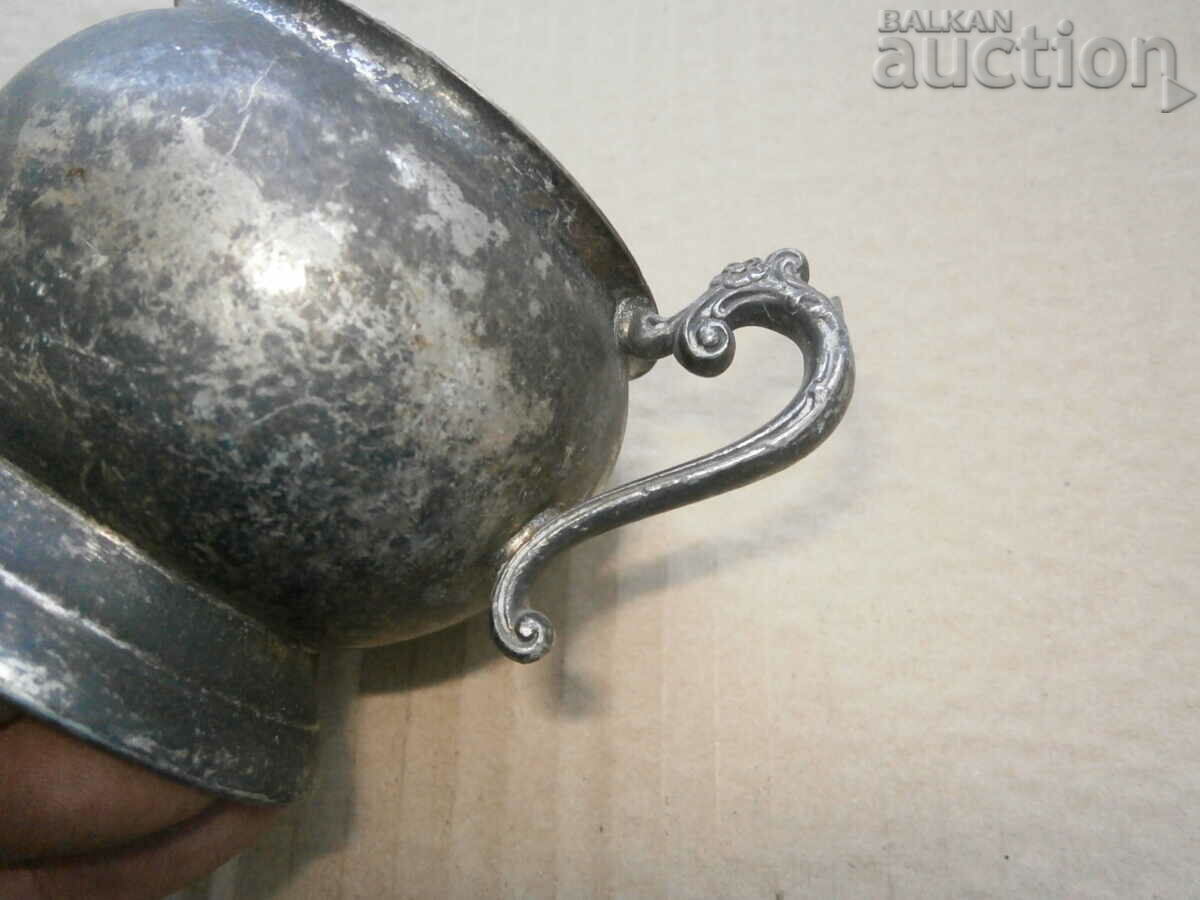 Delivery of small antique milk jug Delivery of small antique milk jug