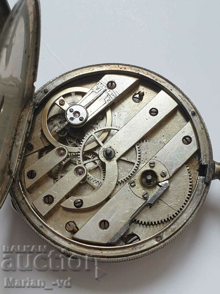 Auction Old silver pocket watch with key Auction Old silver pocket watch with key