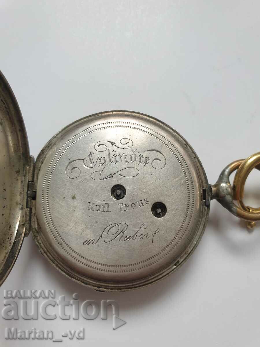 Delivery of Old silver pocket watch with key Delivery of Old silver pocket watch with key