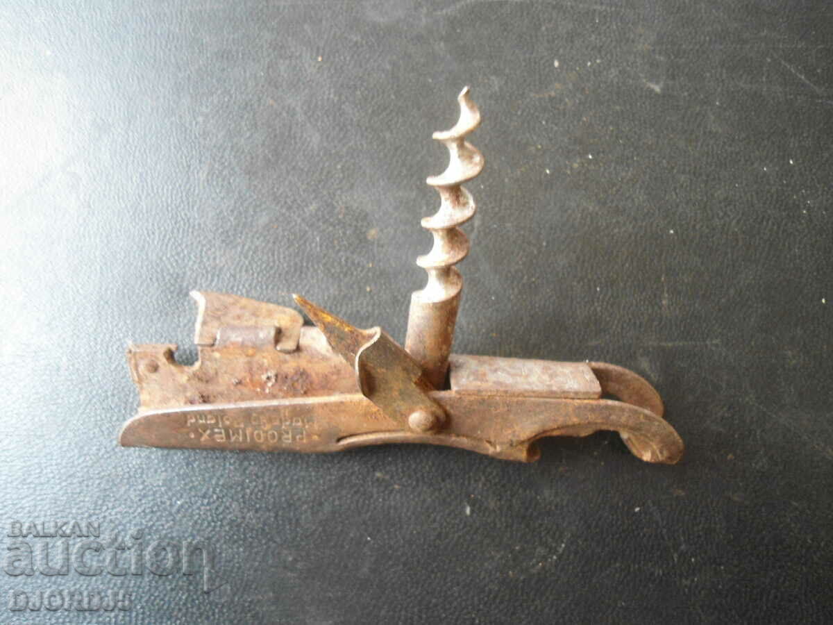 Auction Old multifunction opener, marked Auction Old multifunction opener, marked