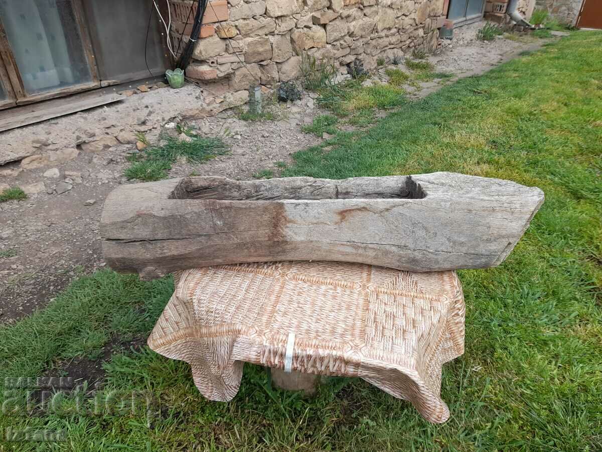 Ancient wooden trough, feeder