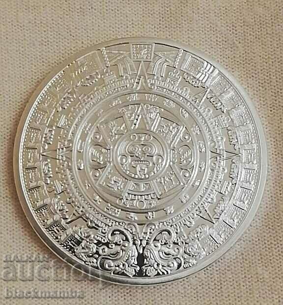 Replica monedei „Calendarul Aztec”.