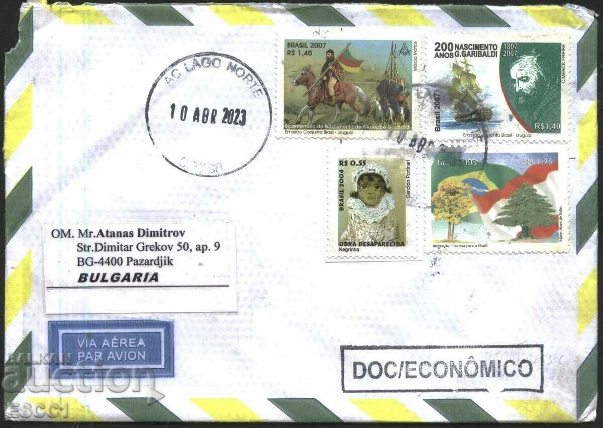 Traveled envelope with stamps Ships 2007 Flags 2005 from Brazil