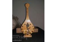 Souvenir watch, Musical instrument