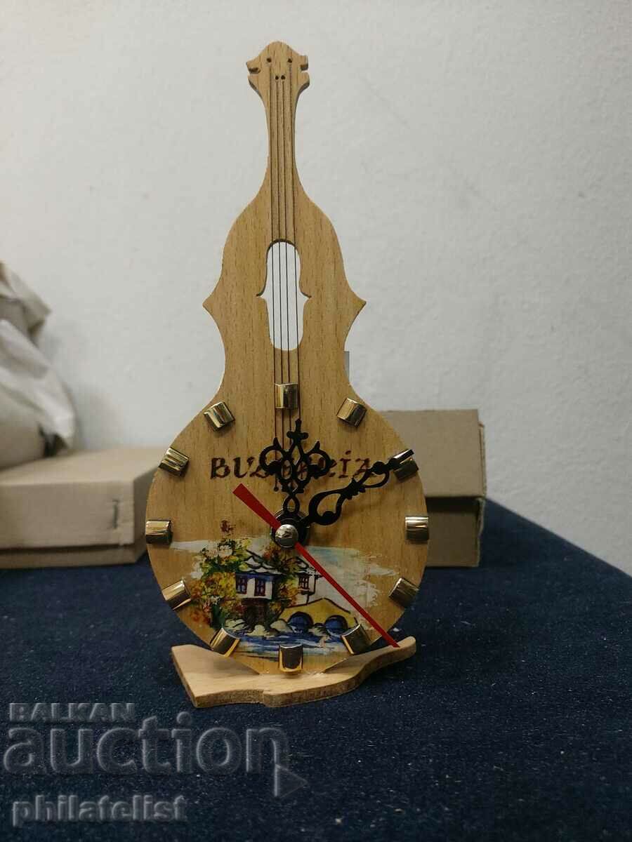 A gift - a wooden violin, a watch!