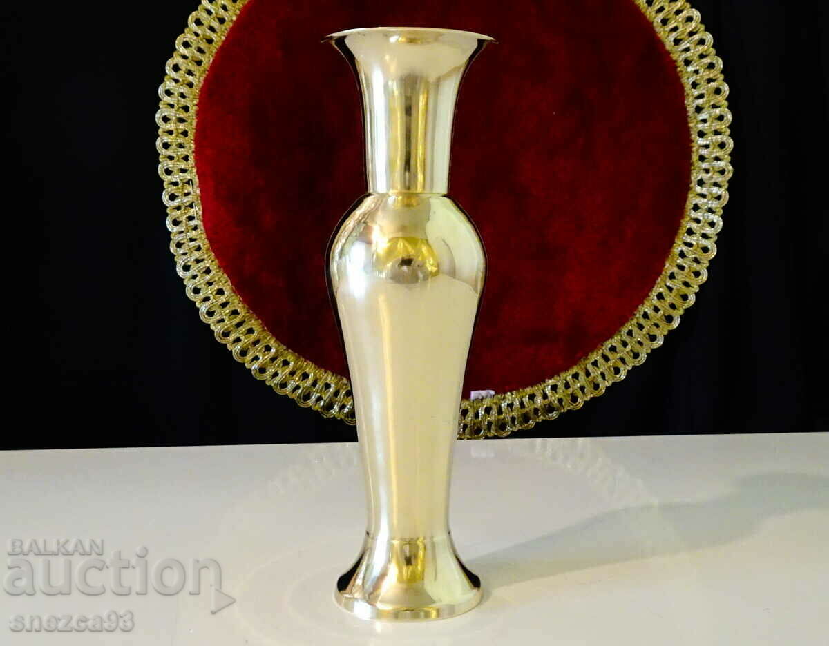 Bronze vase, candlestick, napkin holder.