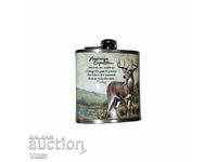 Metal souvenir alcohol jug with deer