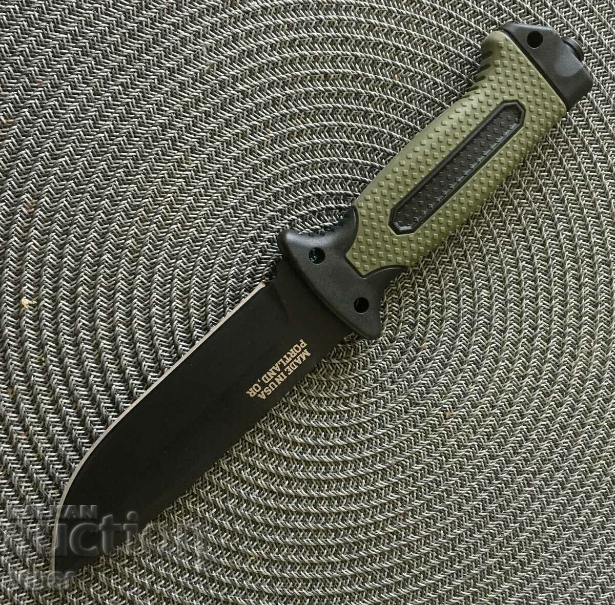 Tactical knife with magnesium lighter, diamond stick, whistle/