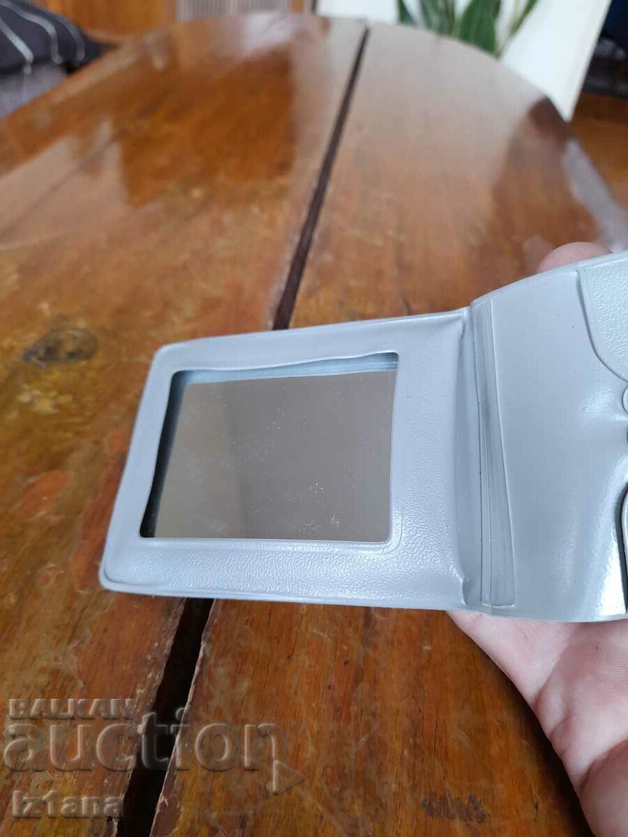 Delivery of Old women's pocket mirror, mirror