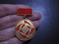 Pentru realizări în TNTM Medalie semn SOC