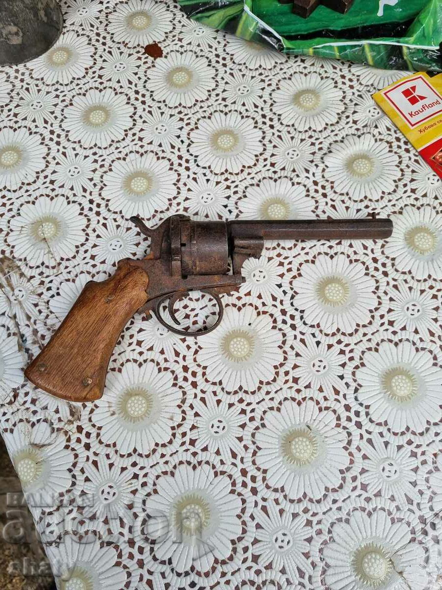Revolver. A gun. Lefuchet.