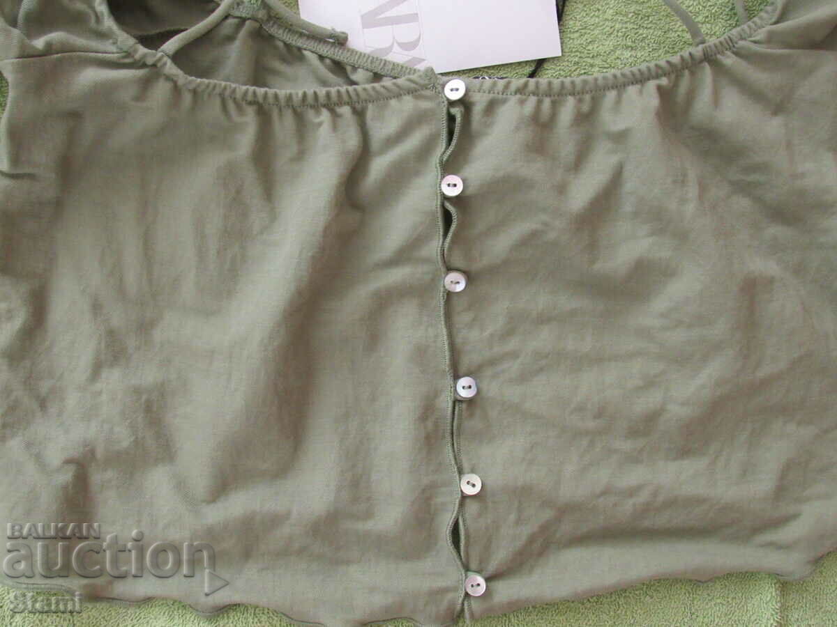 Κοντό τοπ με ισπανική λαιμόκοψη, μακριά μανίκια και τιράντες ZARA με τιμή 12.00 BGN | € 6.14 Κοντό τοπ με ισπανική λαιμόκοψη, μακριά μανίκια και τιράντες ZARA με τιμή 12.00 BGN | € 6.14