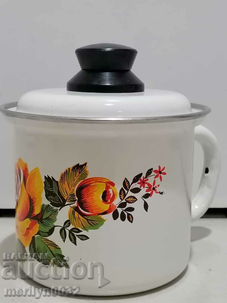 Enameled jug with a lid, a teapot from a soca pot with enamel