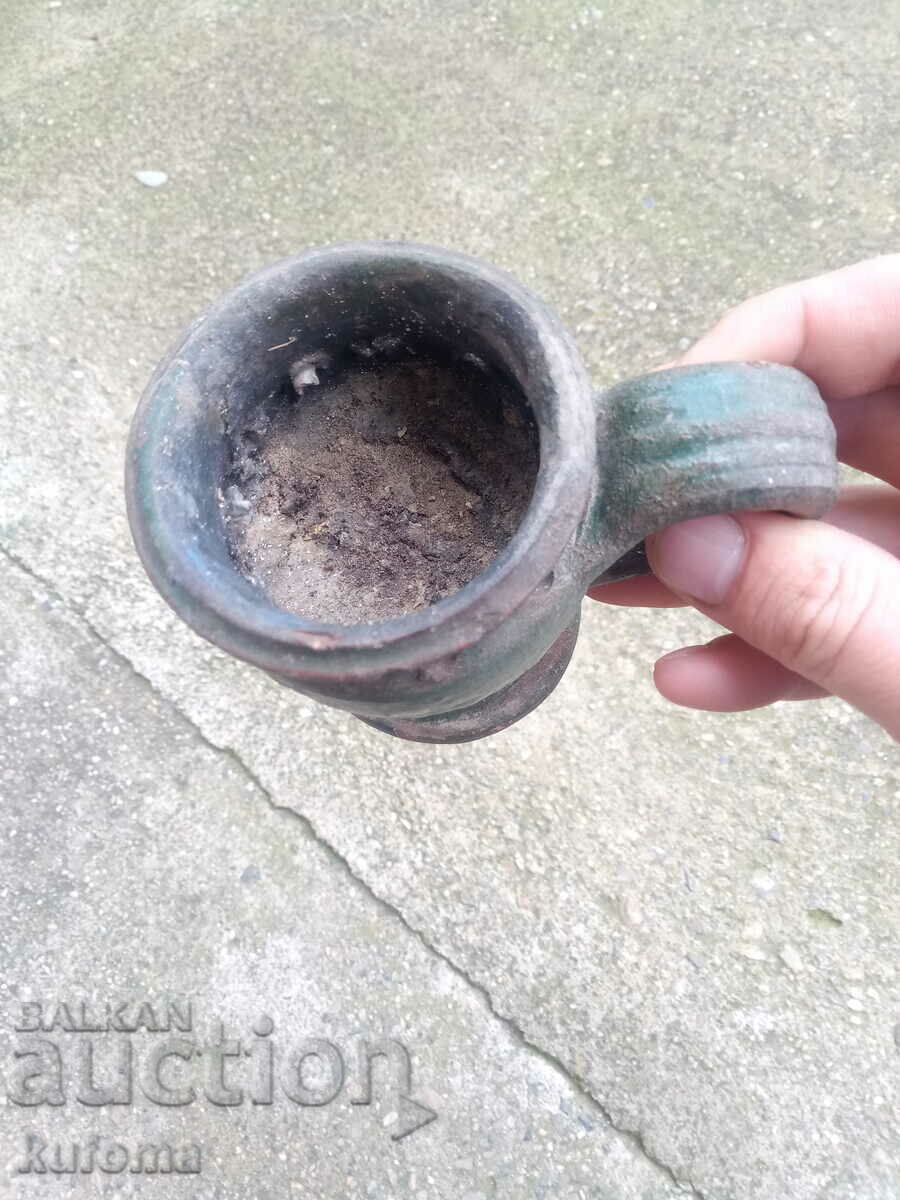 Auction An old ceramic candela Auction An old ceramic candela