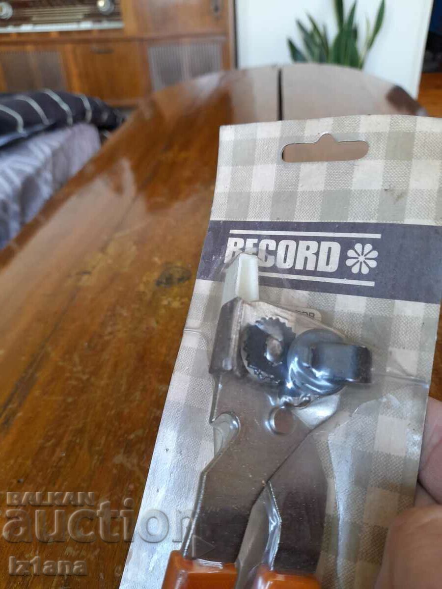 Delivery of An old RECORD can opener Delivery of An old RECORD can opener